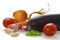 Tomatoes, peppers, garlic, eggplant, onions, carrots on a white isolated background