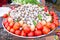 Tomatoes and quail eggs on a scale