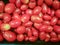 Tomatoes on the shelves waiting for cooking