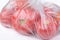 Tomatoes in a transparent plastic bag