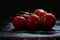 Tomatoes under water drops