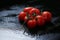 Tomatoes under water drops