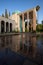 Tomb of Saadi in Shiraz Reflected on Wet Floor on a Sunny Day