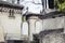 Tombstones in cemetery at dusk, gothic style crosses