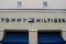 Tommy Hilfiger sign and logo at Premium Outlet in International Drive area .