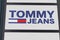 Tommy jeans Hilfiger text sign and logo store front of American clothing company shop