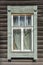 Tomsk, window of an old wooden apartment building