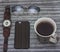 Toned image. Layout. Workplace freelancer. Smartphone, notebook, glasses, a cup of tea, clock,