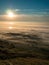 Toned image multicolored sunset above the clouds against the background of the Norwegian Sea