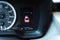 Toned photo open trunk dashboard warning lights with LED odometer, speedometer, illuminated boot lid symbol