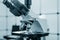 Toned photo of scientific trinocular microscope with camera in science laboratory