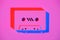 toned pink picture of retro audio cassette