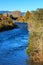 Tongariro River, New Zealand, with autumn trees