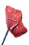 Tongs Holding Raw Beef Loin Top Sirloin Steak