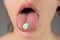 Tongue with drugs. LSD. Psychedelic hallucinogens. Drug addiction.