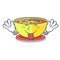 Tongue out corn chowder in a cartoon plate