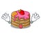 Tongue out pancake with strawberry mascot cartoon