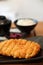 Tonkatsu fried pork cutlet with rice and soup on wooden table Japanese food