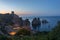 Tonnara and Faraglioni rocks in Scopello at dusk