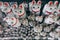 Tons of small dolls `the beckoning cat` known as maneki neko