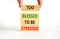Too blessed to be stressed symbol. Concept words Too blessed to be stressed on wooden blocks. Beautiful white table white