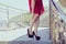 Too small big shoes beauty black red short outfit medical condition spasm muscle concept. Close up low angle view photo portrait o