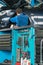Tool Cart With Male Mechanic Repairing Car