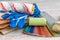 Tool paint palette and paintbrush, blue gloves for repair house