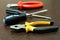 tool repair manual pliers black yellow contrasting two screwdrivers and nippers focus on foreground on a blurred background