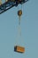 Toolbox hanging off a construction crane