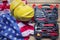 Toolbox and two helmets with American flag