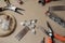 Tools for creating jewelry. Beads, crystals, glass bottles with cork lids, hair combs. Wire, cutters, pliers