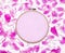 Tools for cross stitch. A hoop for embroidery, canvas and peony petals on white