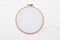 Tools for cross stitch. A hoop for embroidery and canvas on white