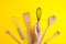 Tools pastry kitchen utensile for cooking dessert, over yellow background with copy space, still life. Top view.