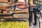 Tools for repair: roller, chisel, pliers, glass cutter on a wooden background