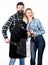 Tools for roasting meat outdoors. Picnic and barbecue. Bearded hipster and girl ready for barbecue party. Roasting and