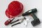 Tools set with safety helmet, drill, wrenches, walkie-talkie and safety glasses