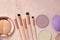 Tools for women`s makeup, brushes for applying powder, eye shadow and lip gloss, beauty blender