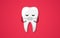 Tooth isolated on a red background. Orthodontic treatment braces on teeth. Clean happy and smiling. Cute cartoon character.