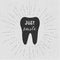 Tooth. Just smile. Vector. Black tooth on white background. Vintage retro sunburst, grunge background.