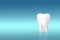 Tooth white molar model on pastel blue background. Tooth symbol sign. Dentistry conceptual photo. Implant. Orthodontics.