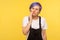 Toothache. Portrait of ill woman touching chin and frowning from dental pain. yellow background, studio shot