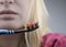 Toothbrush with blood closeup. A woman discovered bleeding gums while brushing her teeth. Gingivitis or periodontal disease