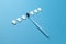 Toothbrush and teeth on blue background. Prevention and care of the oral cavity