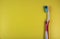 Toothbrush on a yellow background in the style of pop art