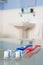 Toothbrushes in bathroom