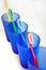 Toothbrushes in beakers