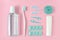 Toothbrushes, toothpaste, rinse and chewing gum set on pink background. Dental and healthcare concept.