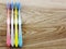 toothbrushes on wooden background with space copy